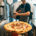 could be a food drive - work with pizza or some other restaurant